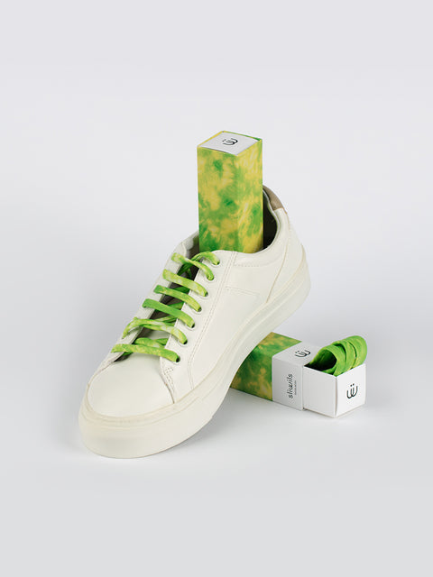 Zapatillas con cordones verdes desteñidos