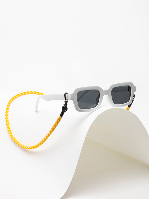 cordón para gafas de sol amarillo con lunares blancos
