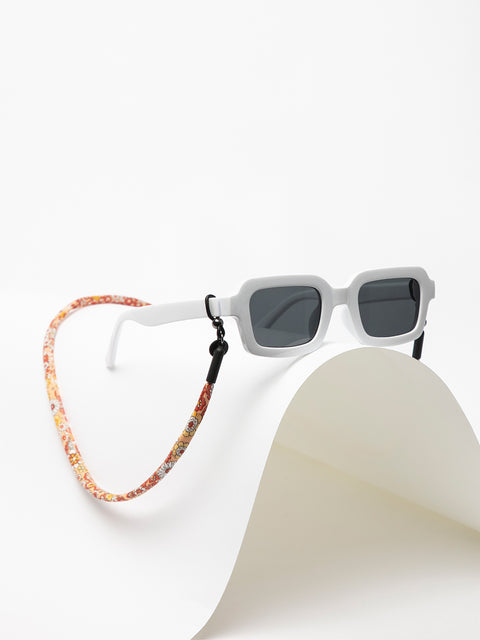 cordón para gafas de sol con flores naranjas