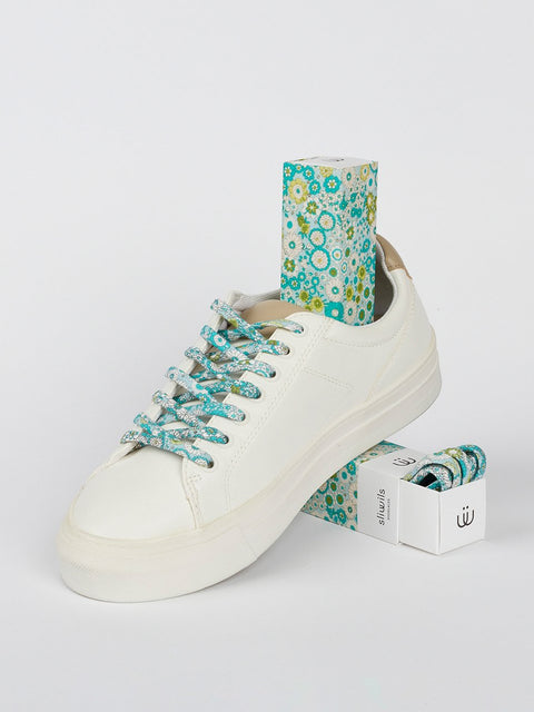 Zapatillas con cordones de flores verdes y azules